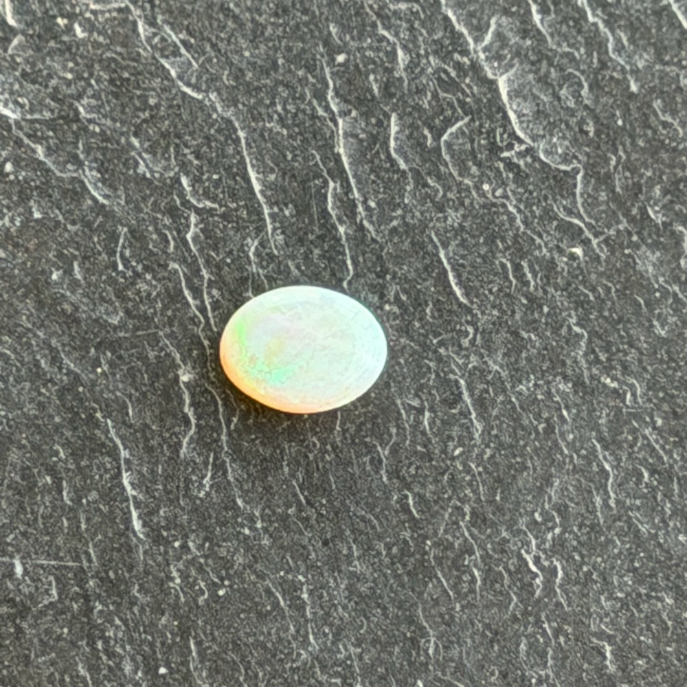 Iridescent Opal Oval Gemstone .74 carats